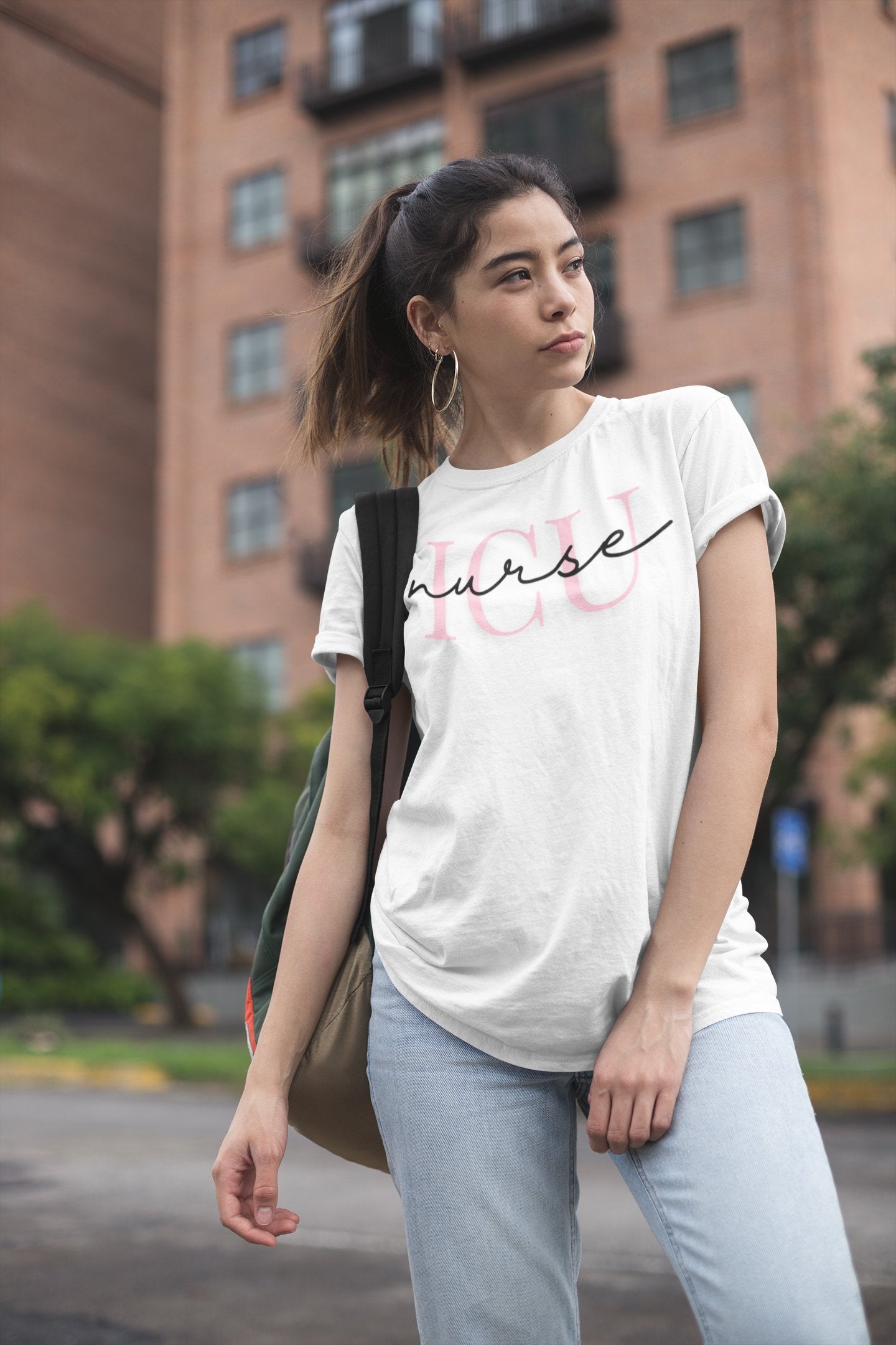 a girl wearing an icu nurse shirt